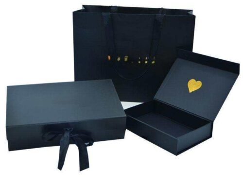 Black paper bag with matching flat magnetic closure paper box with gold foil stamping