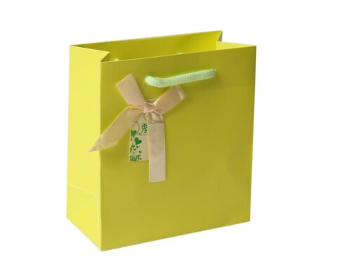 Print Your Logo on Premium Quality Yellow Paper Bags With ribbon bow decoration